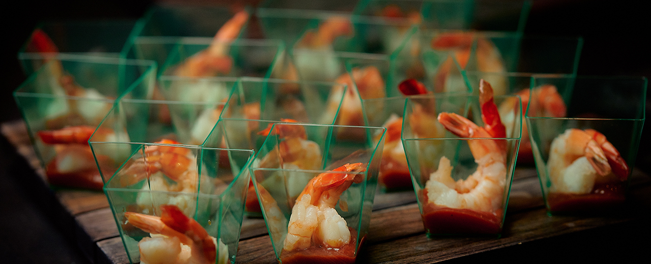 A tray of shrimp cocktail.